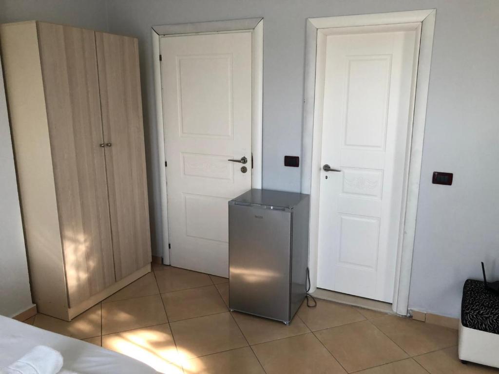 Postel nebo postele na pokoji v ubytování Vila Olti