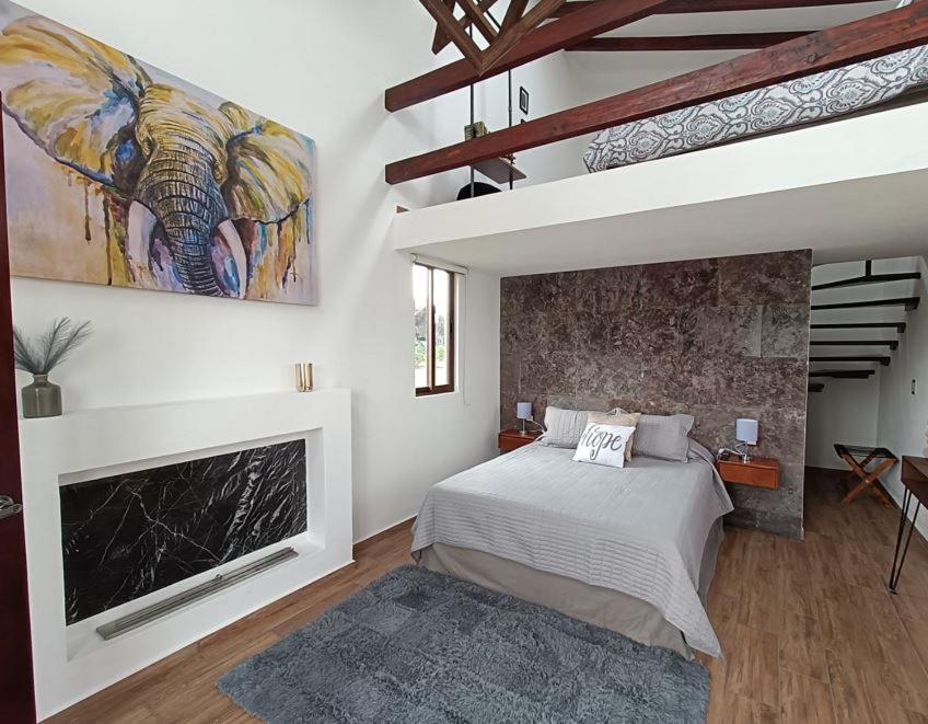 Postel nebo postele na pokoji v ubytování Mantra Glamping & Chalets