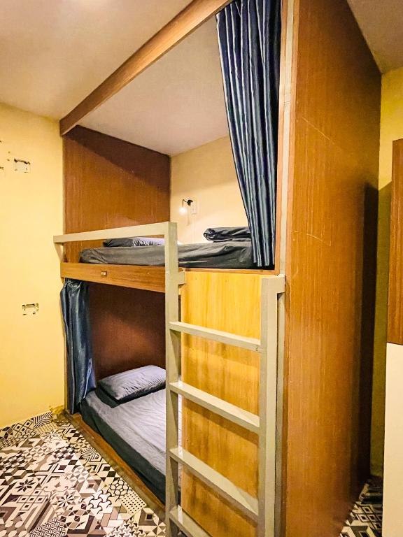 Postel nebo postele na pokoji v ubytování Vy Da Backpacker Hostel