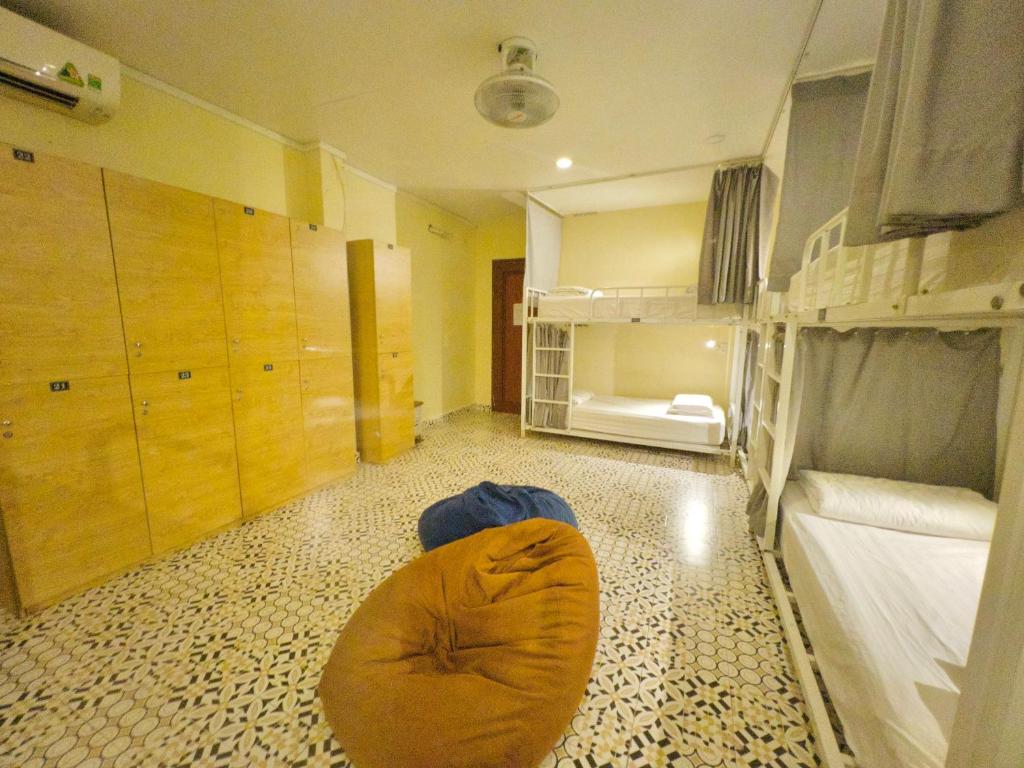 Postel nebo postele na pokoji v ubytování Vy Da Backpacker Hostel