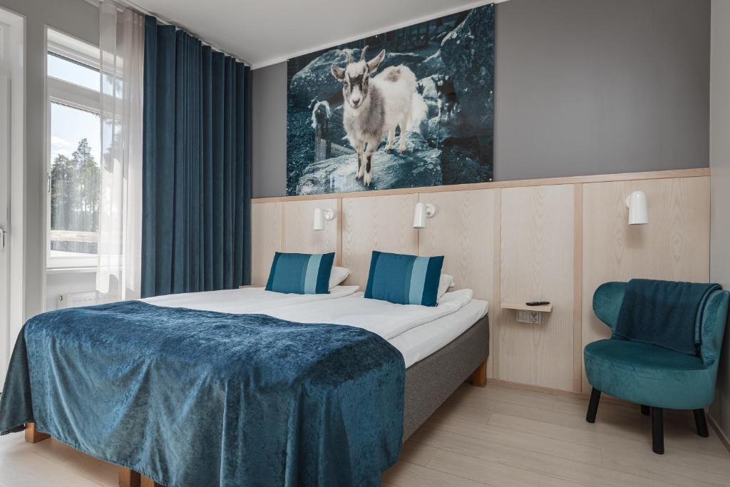 Postel nebo postele na pokoji v ubytování Furuvik Havshotell