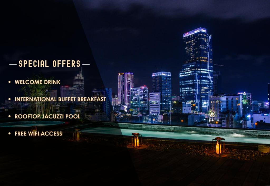 a view of a city skyline at night at Cochin Zen Hotel in Ho Chi Minh City