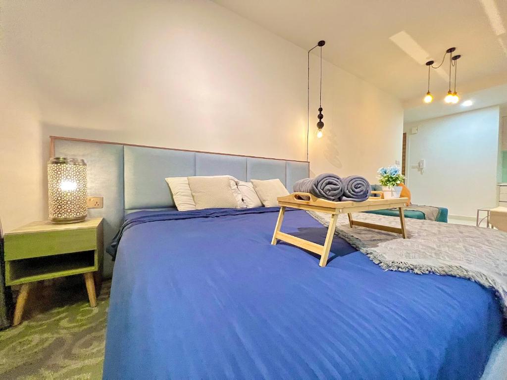 Postel nebo postele na pokoji v ubytování Teega Suites Studio by Luxecocoo CK Puteri Harbour