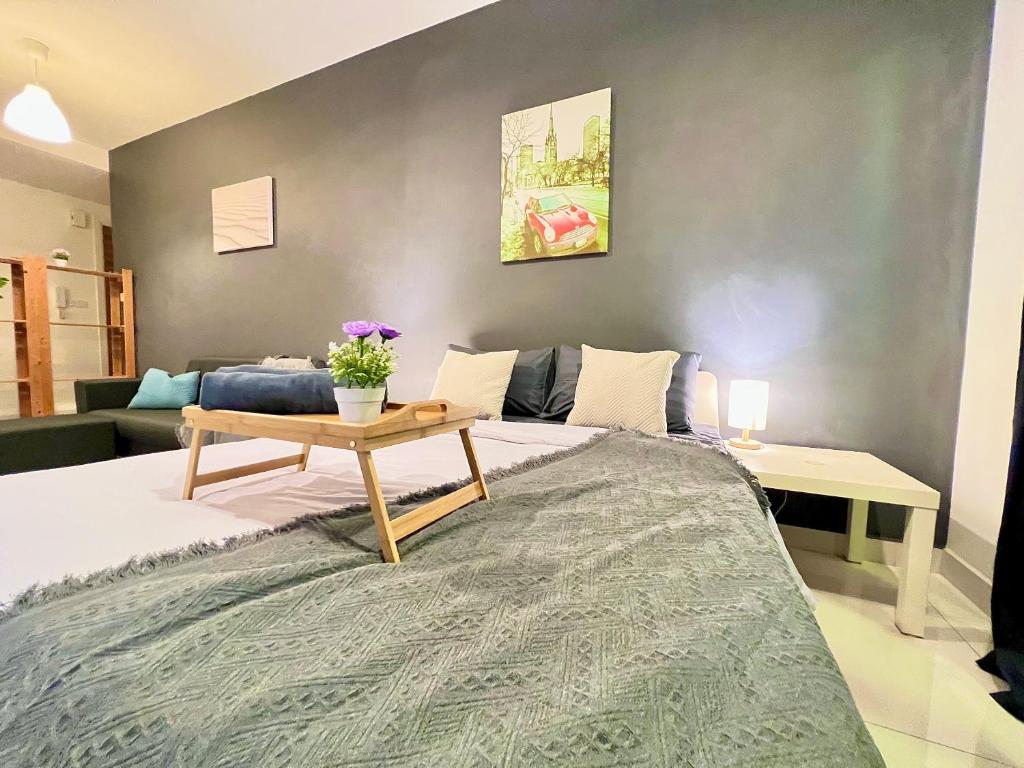 Postel nebo postele na pokoji v ubytování Teega Suites Studio by Luxecocoo CK Puteri Harbour