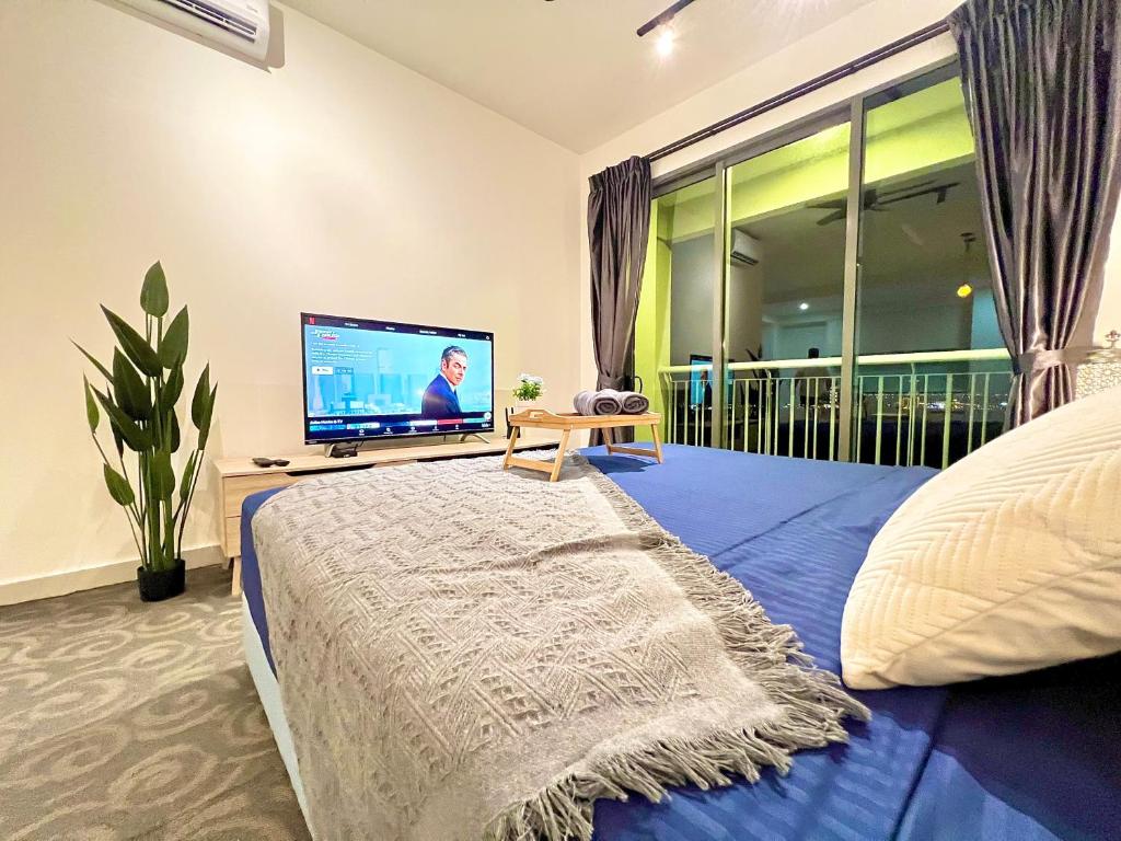 TV a/nebo společenská místnost v ubytování Teega Suites Studio by Luxecocoo CK Puteri Harbour