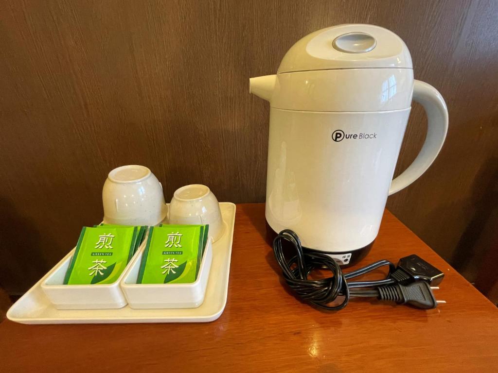 Příslušenství pro přípravu čaje a kávy v ubytování Gora Hotel Paipuno Kemuri Plus