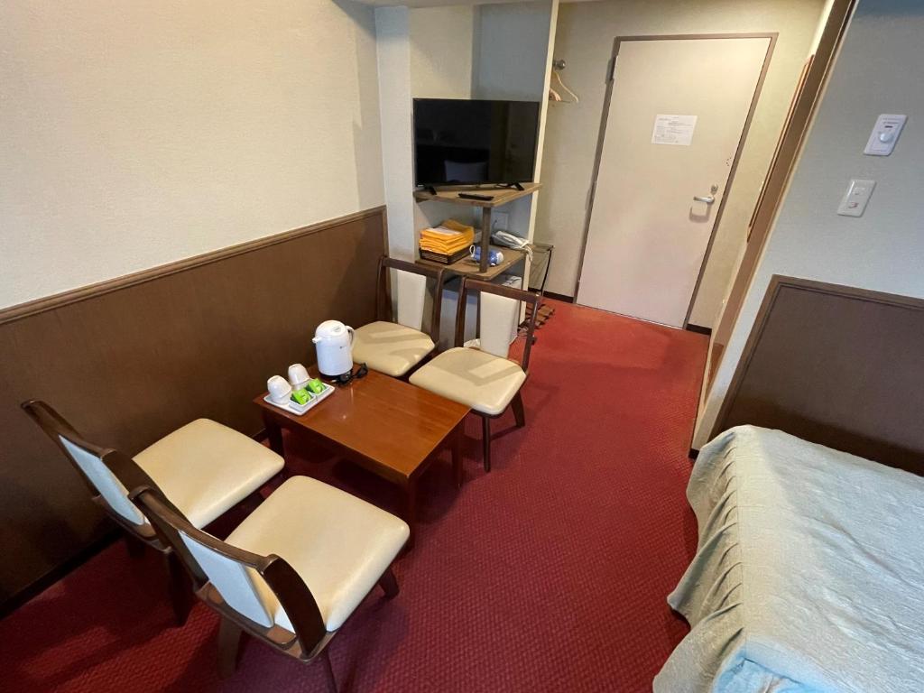 TV a/nebo společenská místnost v ubytování Gora Hotel Paipuno Kemuri Plus