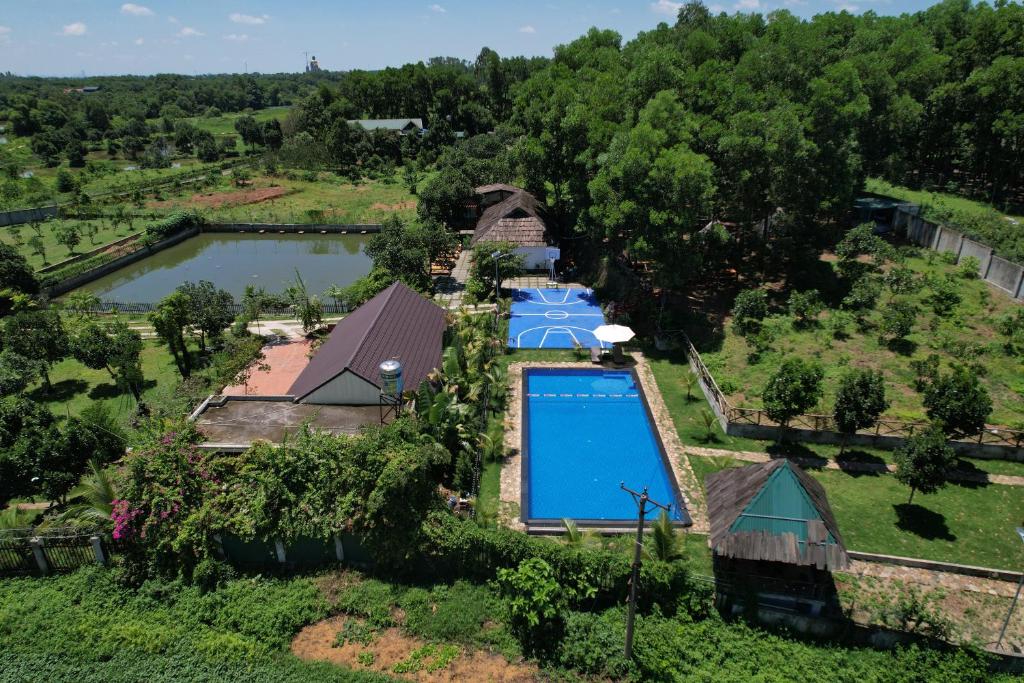 an aerial view of a house with a swimming pool at Viewest Glamping Dong Mo in Hanoi