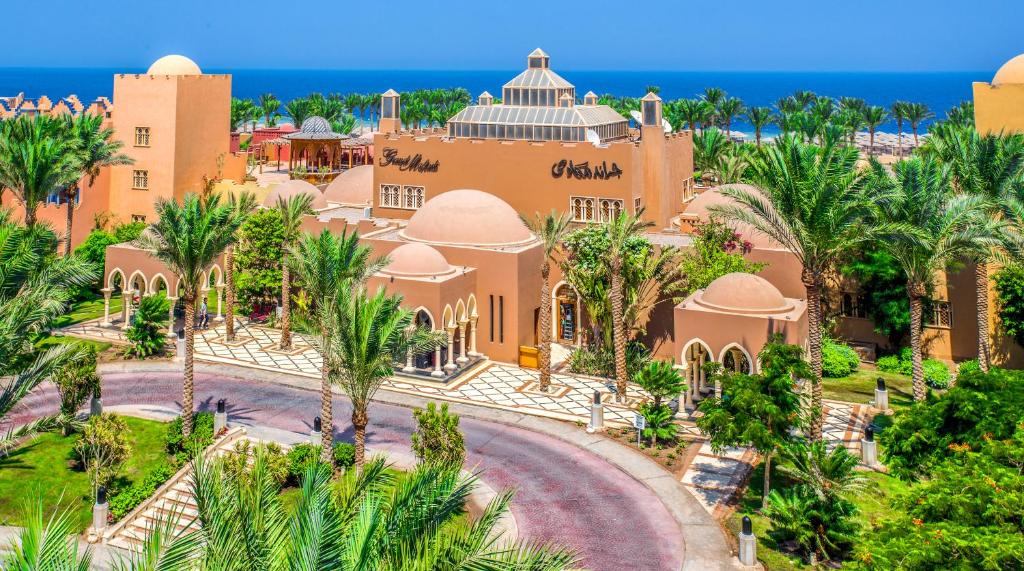 an aerial view of a resort with palm trees at Grand Makadi - Couples and Families Only in Hurghada