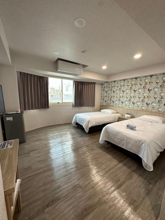 Cama o camas de una habitación en 夢境旅-智能自助旅店