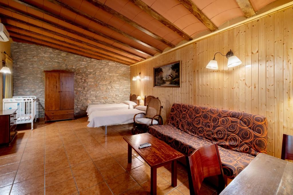 A seating area at Rural Jordà