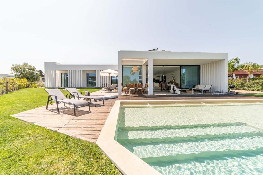 Villa con piscina y casa en Villa Arrabida, en Quinta do Conde