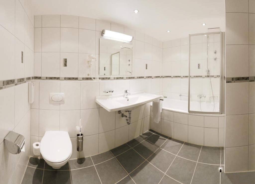 Koupelna v ubytování Hotel Fortuna