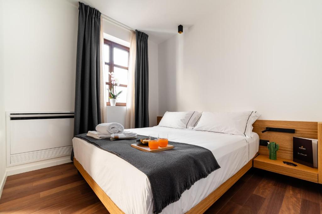 Voodi või voodid majutusasutuse Arringo - Stay comfy toas
