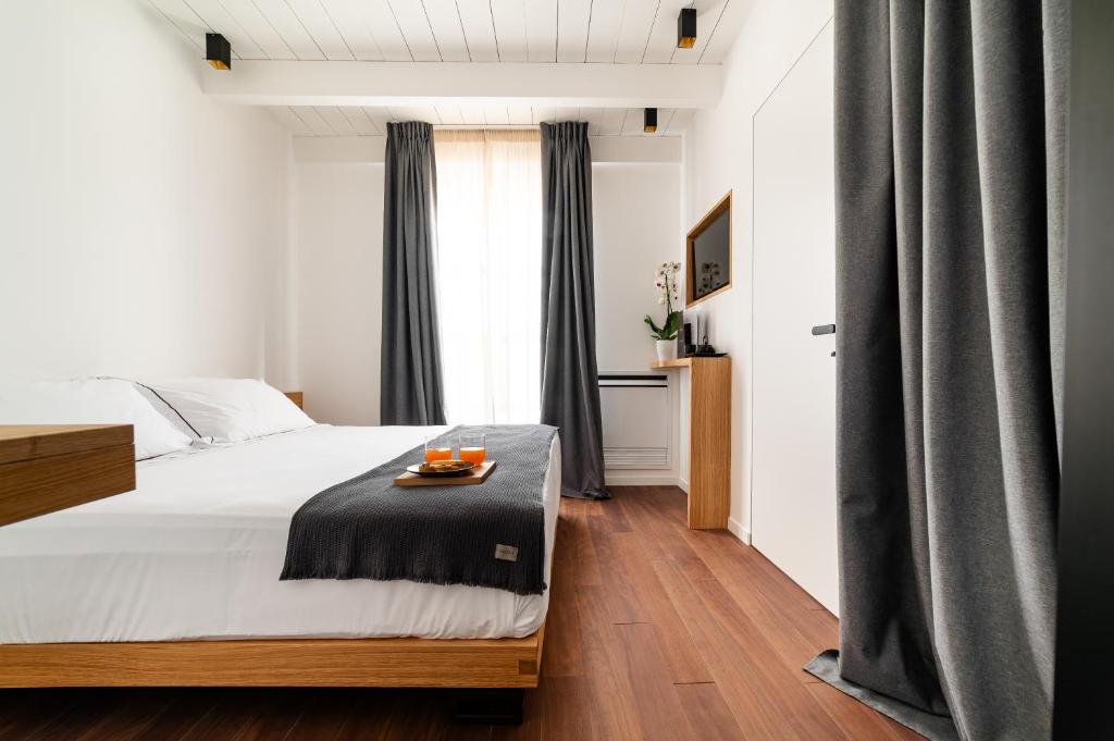 Postel nebo postele na pokoji v ubytování Arringo - Stay comfy