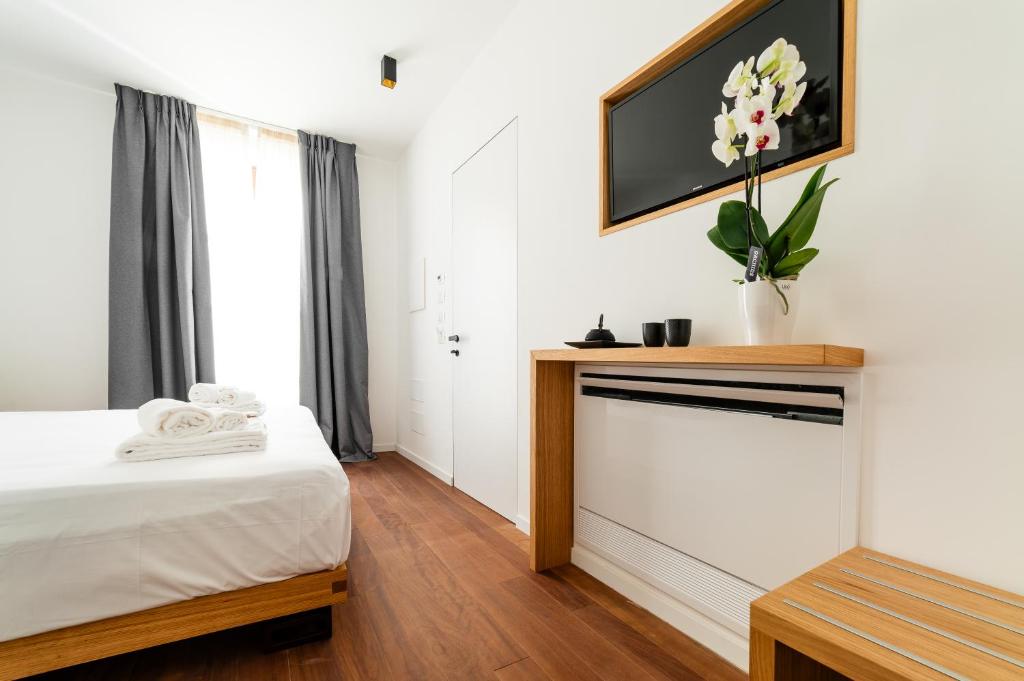 Postel nebo postele na pokoji v ubytování Arringo - Stay comfy