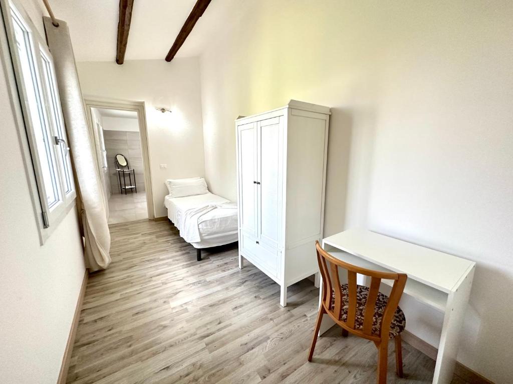 Postel nebo postele na pokoji v ubytování B&B Residenza Luciani Affittacamere