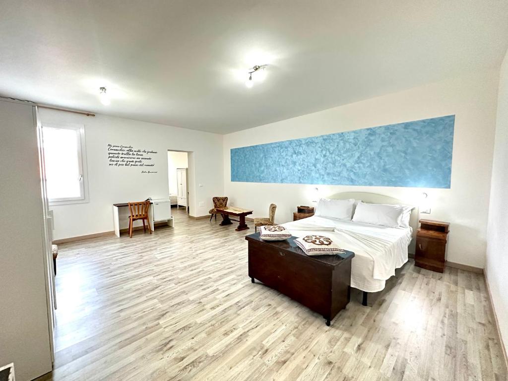 Postel nebo postele na pokoji v ubytování B&B Residenza Luciani Affittacamere