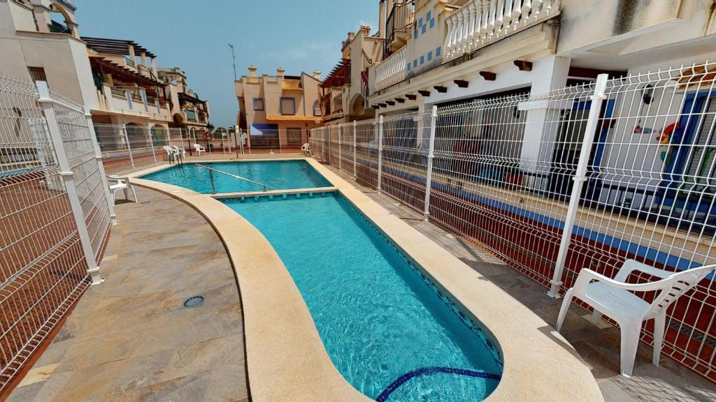 a swimming pool on the side of a cruise ship at Casa Mandolina - A Murcia Holiday Rentals Property in Murcia