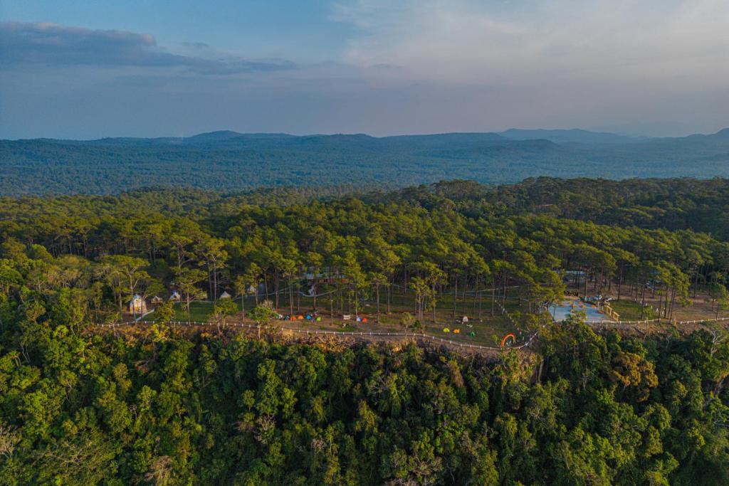 an aerial view of a park in the middle of a forest at Camping Park Resort in Kampong Speu