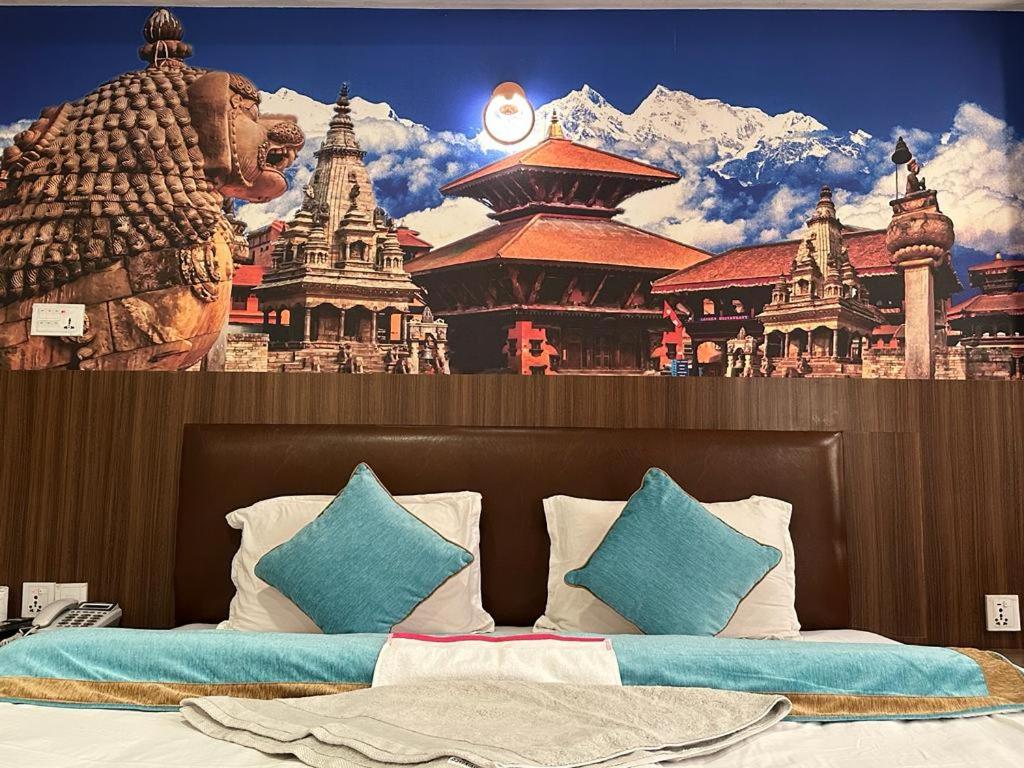 Postel nebo postele na pokoji v ubytování HOTEL PARAMI INN