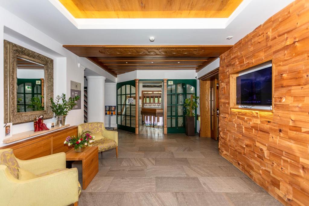 Televízia a/alebo spoločenská miestnosť v ubytovaní Hotel Unser Unterberg