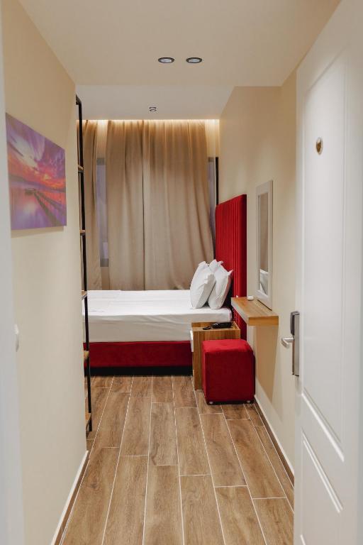 Posteľ alebo postele v izbe v ubytovaní Armar Hotel