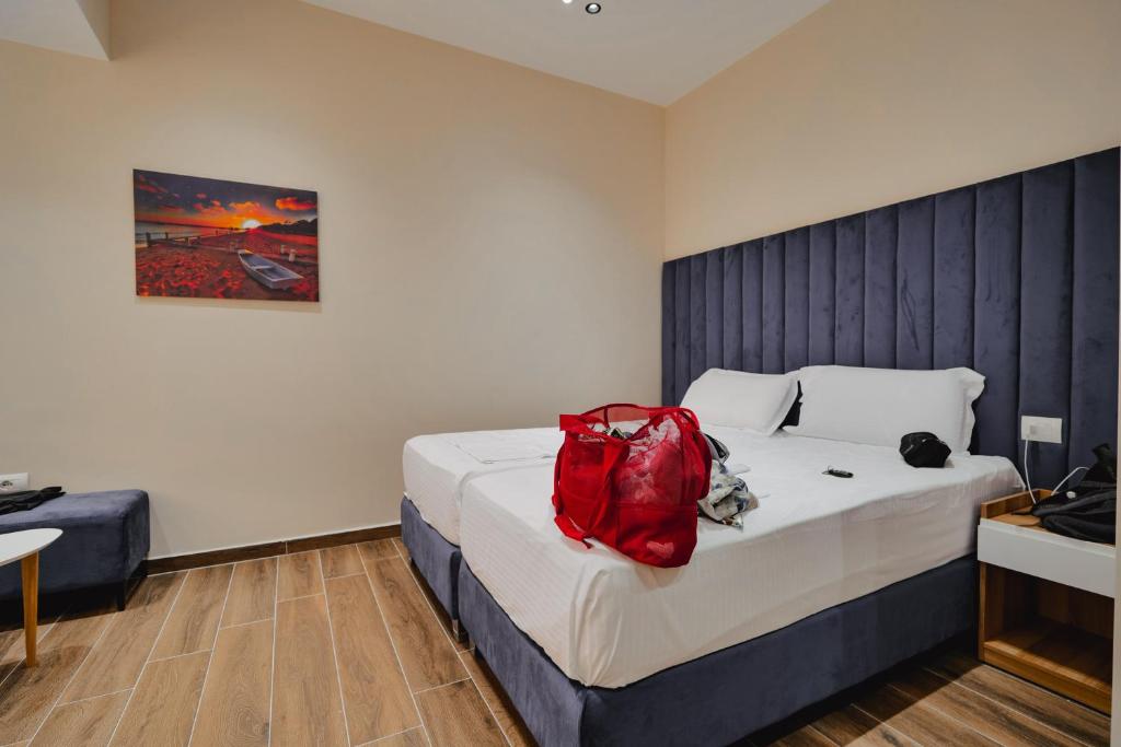 Posteľ alebo postele v izbe v ubytovaní Armar Hotel