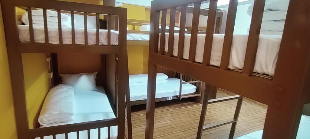 Postel nebo postele na pokoji v ubytování Nepalaya Home Hostel