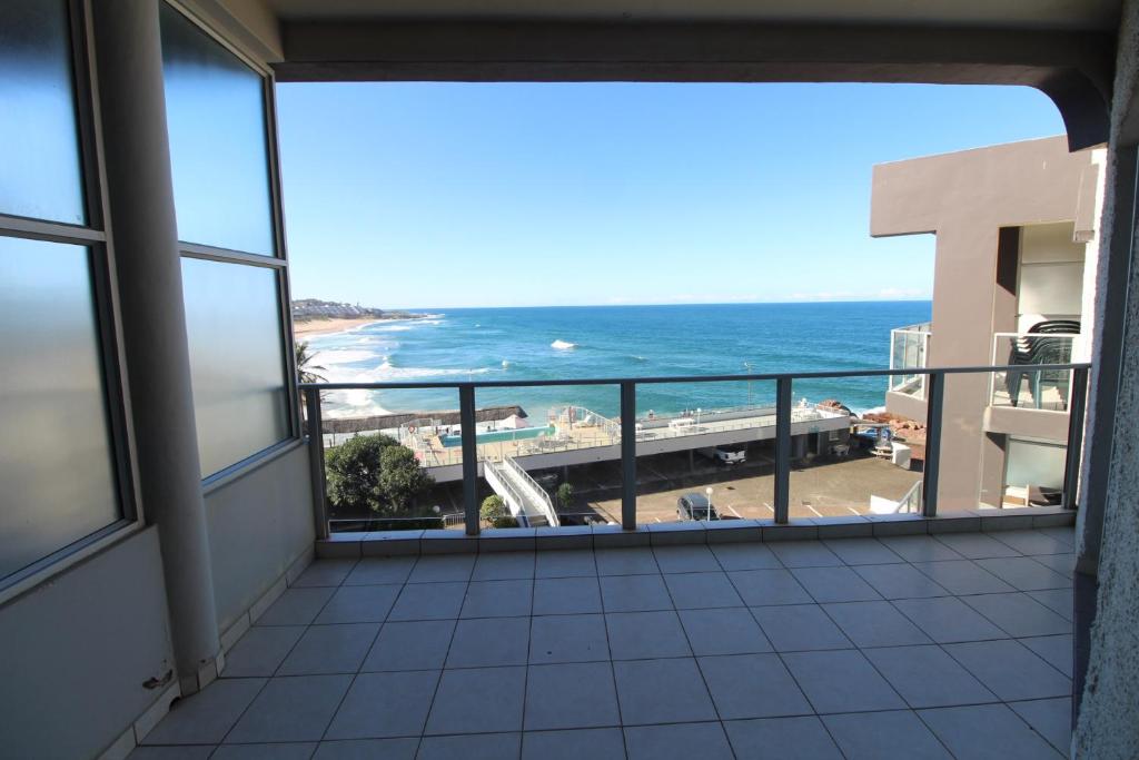 a balcony with a view of the ocean at Seagull 507 in Margate