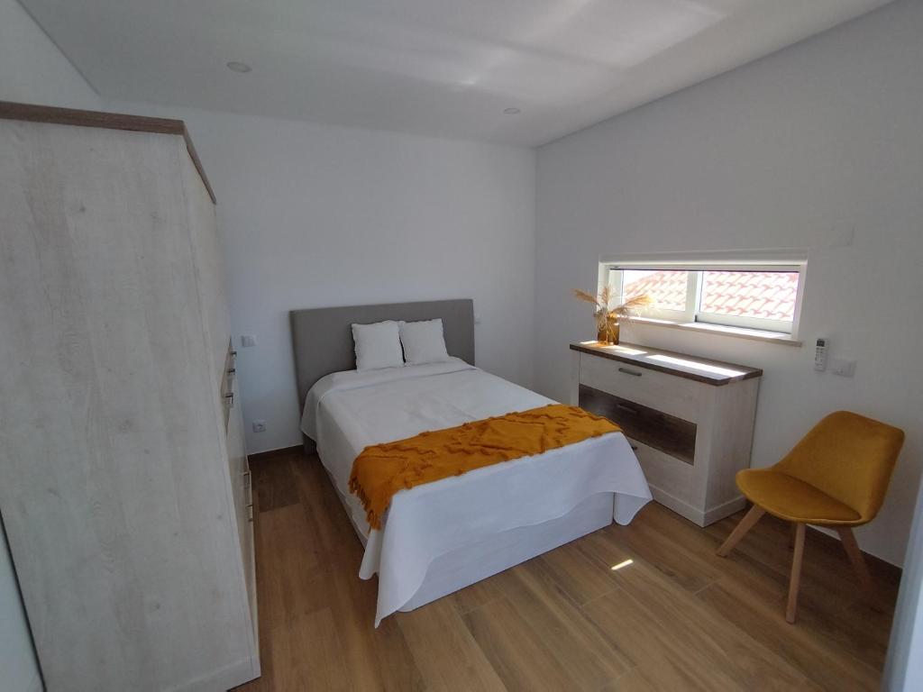 Postel nebo postele na pokoji v ubytování T2 - Praia Pescadores Frente Mar - Casas & Papéis