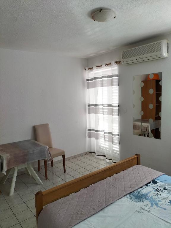 Posteľ alebo postele v izbe v ubytovaní Studie-Apartment in Makarska, Kroatien