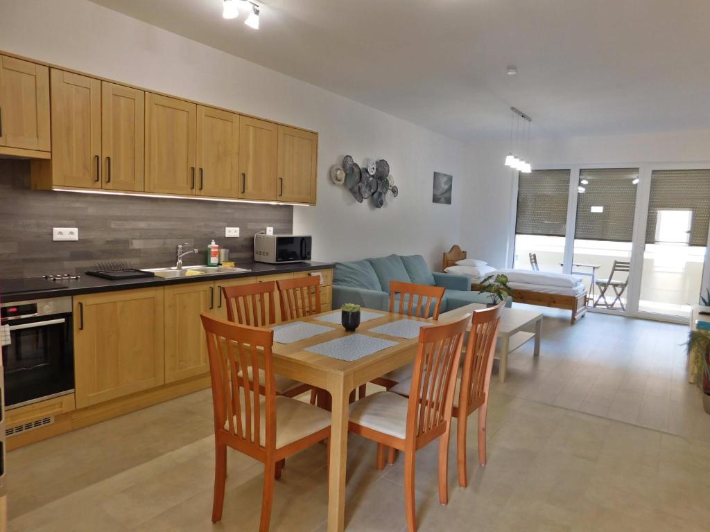A kitchen or kitchenette at Berki Apartman
