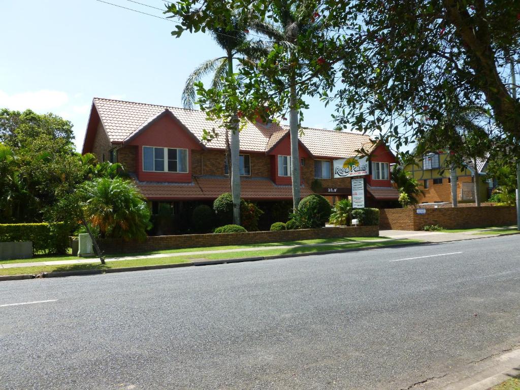 a house on the side of a street at Royal Palms Motor Inn in Coffs Harbour