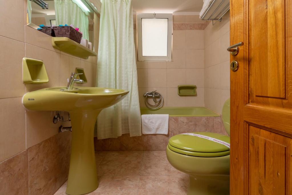Koupelna v ubytování Hotel Elman