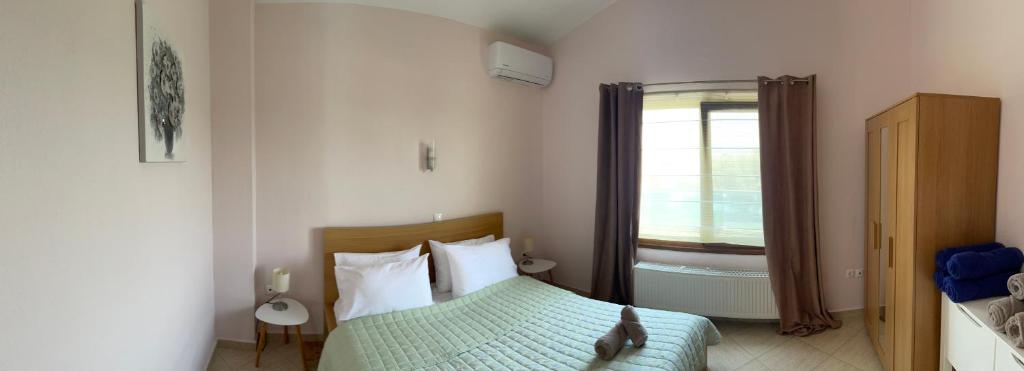 Postel nebo postele na pokoji v ubytování Serenity House
