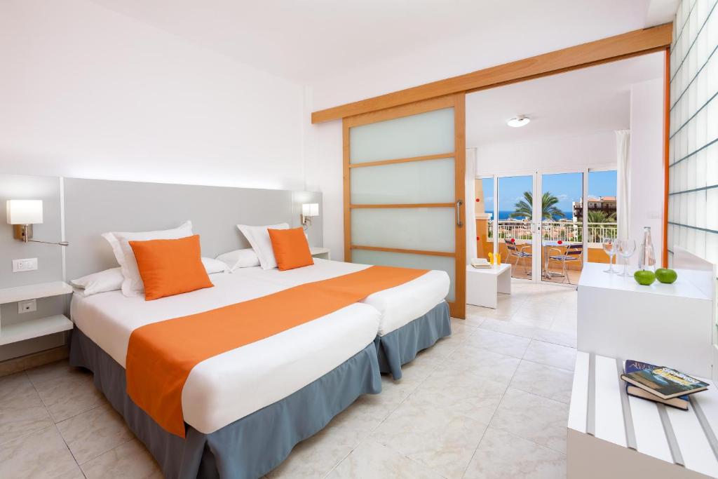 Posteľ alebo postele v izbe v ubytovaní Chatur Playa Real Resort