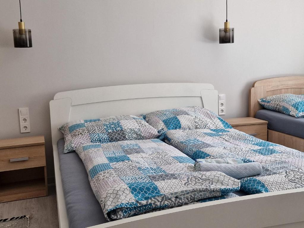 Postel nebo postele na pokoji v ubytování Boros Vendégház