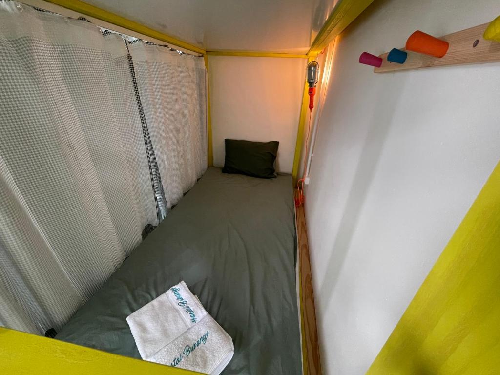 Postel nebo postele na pokoji v ubytování Hostal Bubango