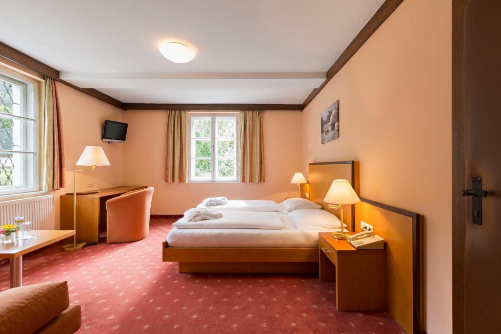 Postel nebo postele na pokoji v ubytování Hotel Restaurant Höldrichsmühle