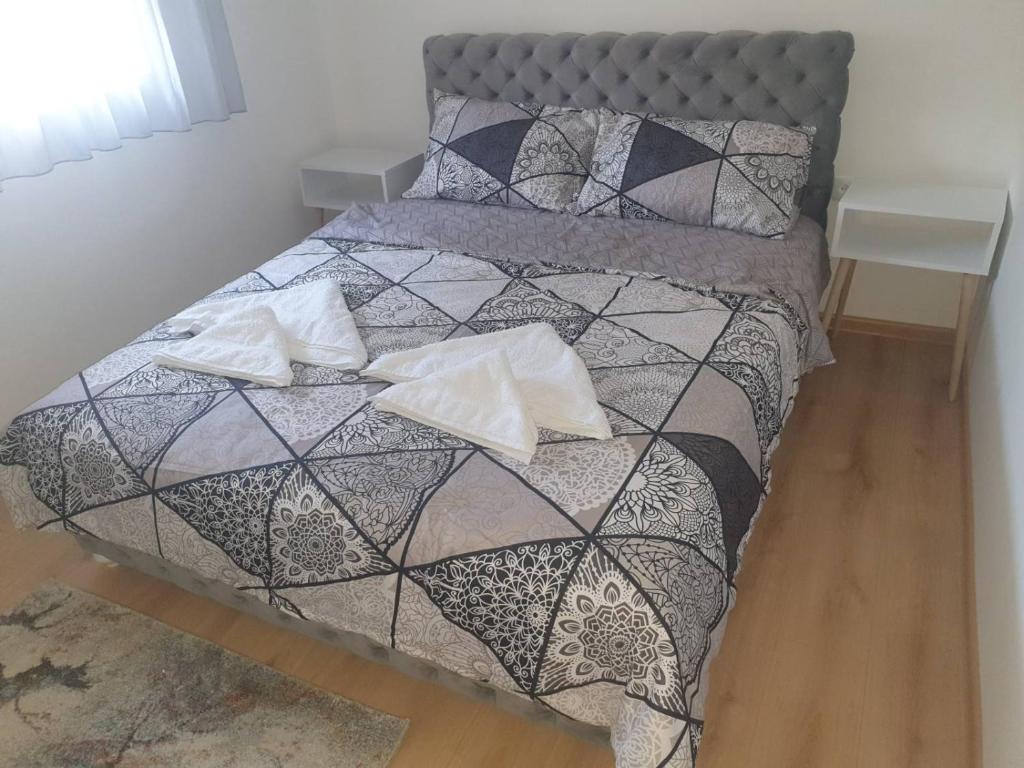 Postel nebo postele na pokoji v ubytování SANI