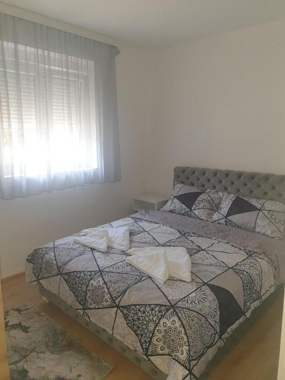 Postel nebo postele na pokoji v ubytování SANI