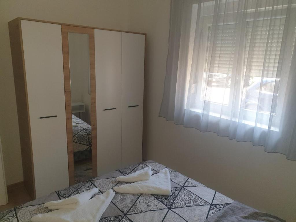 Postel nebo postele na pokoji v ubytování SANI