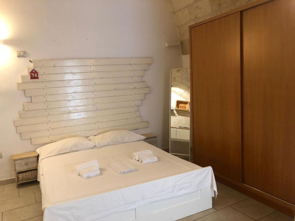 Postel nebo postele na pokoji v ubytování Don Nicola Tourist Location