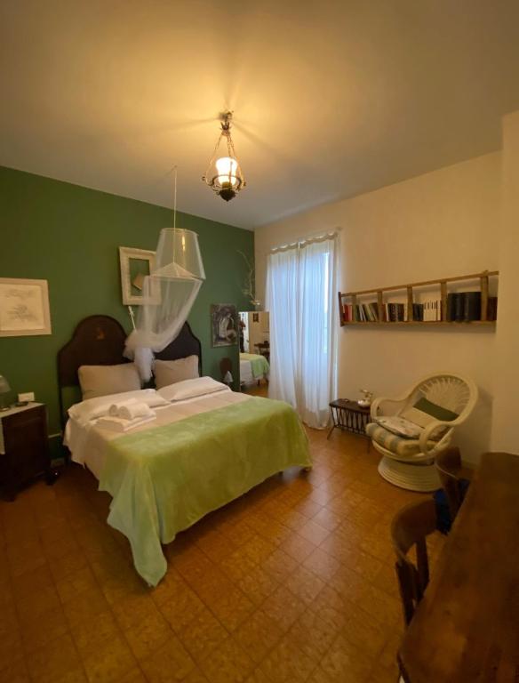 A bed or beds in a room at B&B LaMaGia di Corte Moronati