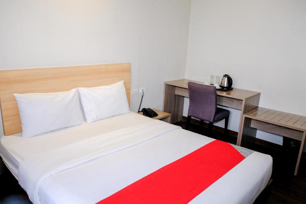Postel nebo postele na pokoji v ubytování Airo Hotel Manila