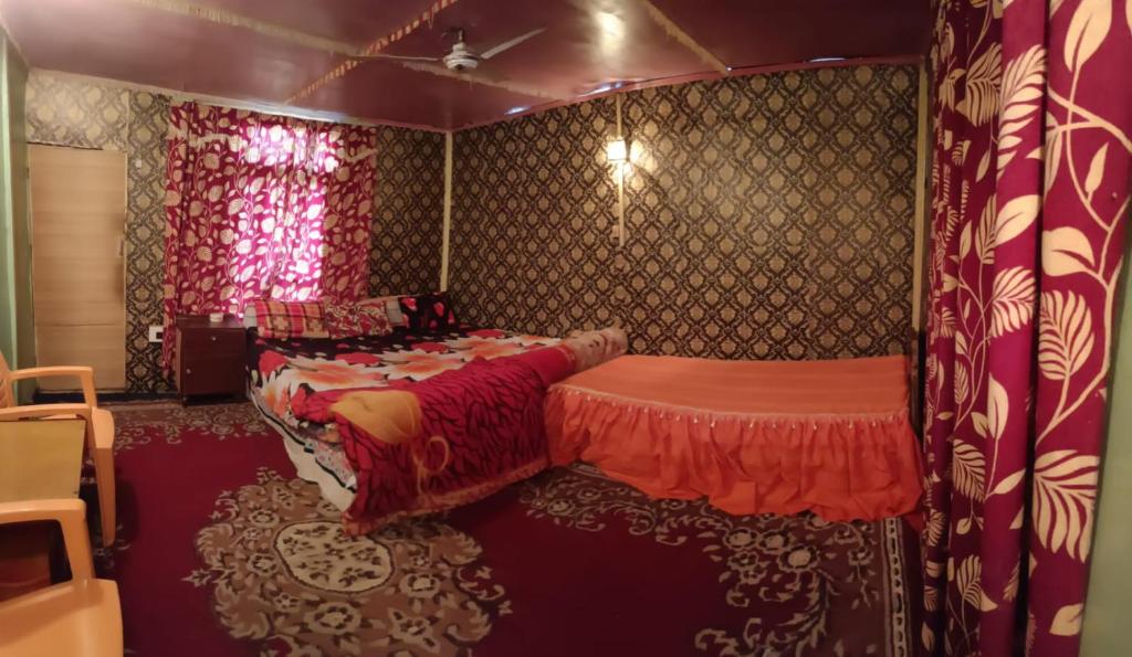 Postel nebo postele na pokoji v ubytování Hotel Island