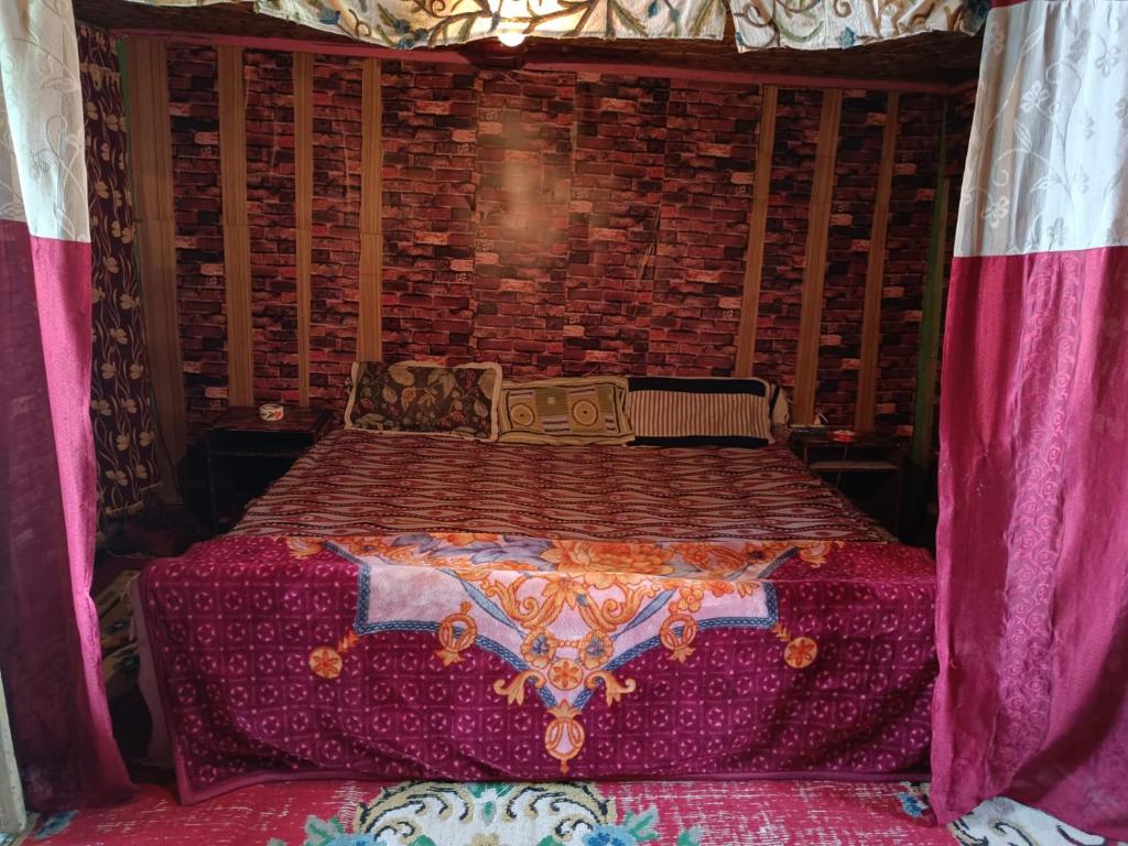 Postel nebo postele na pokoji v ubytování Hotel Island