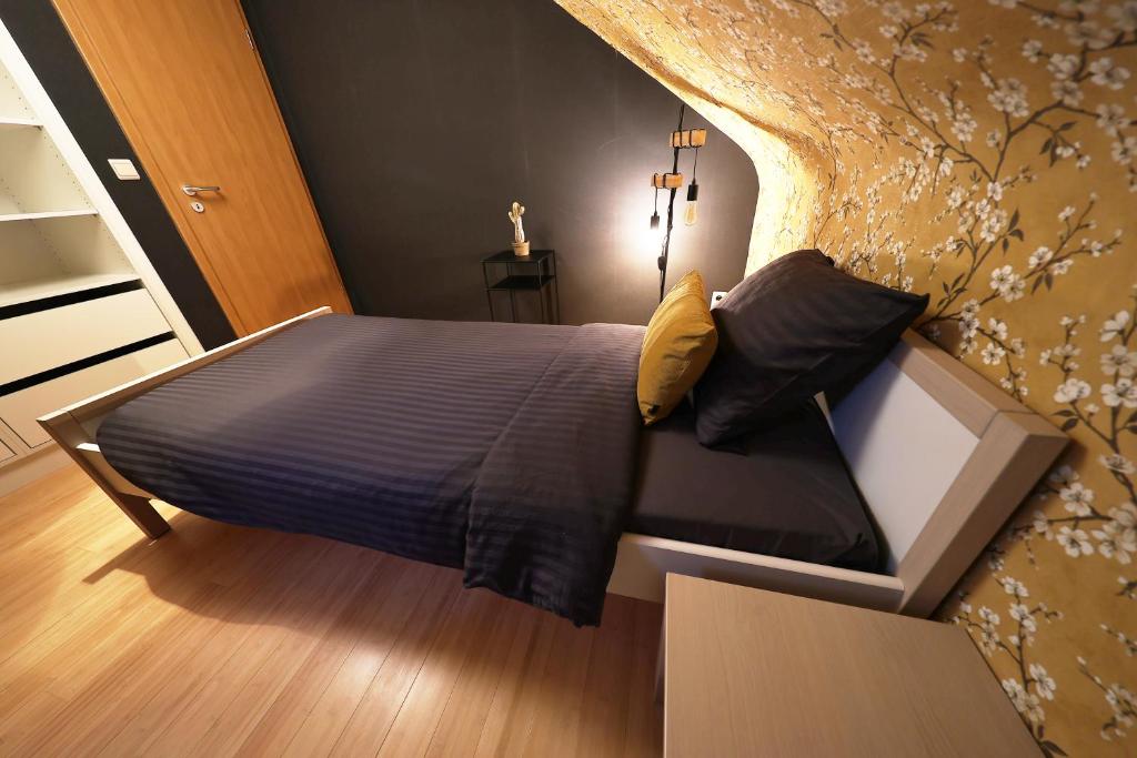 Postel nebo postele na pokoji v ubytování ONSEN PLACE by Ardenne Places
