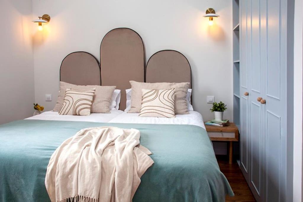 Postel nebo postele na pokoji v ubytování Wishome - Villa sublime con piscina climatizada y vistas